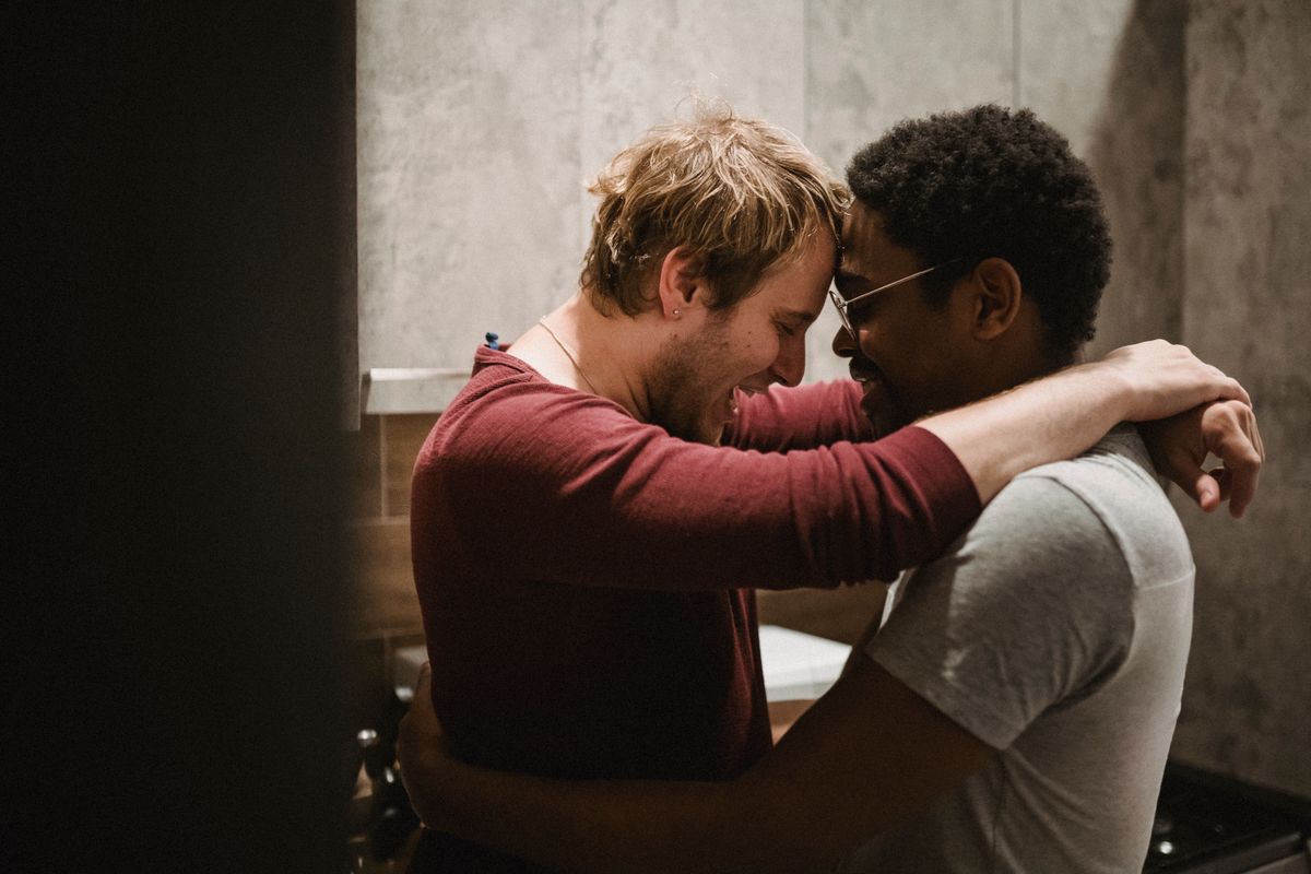 Two men sharing a close moment