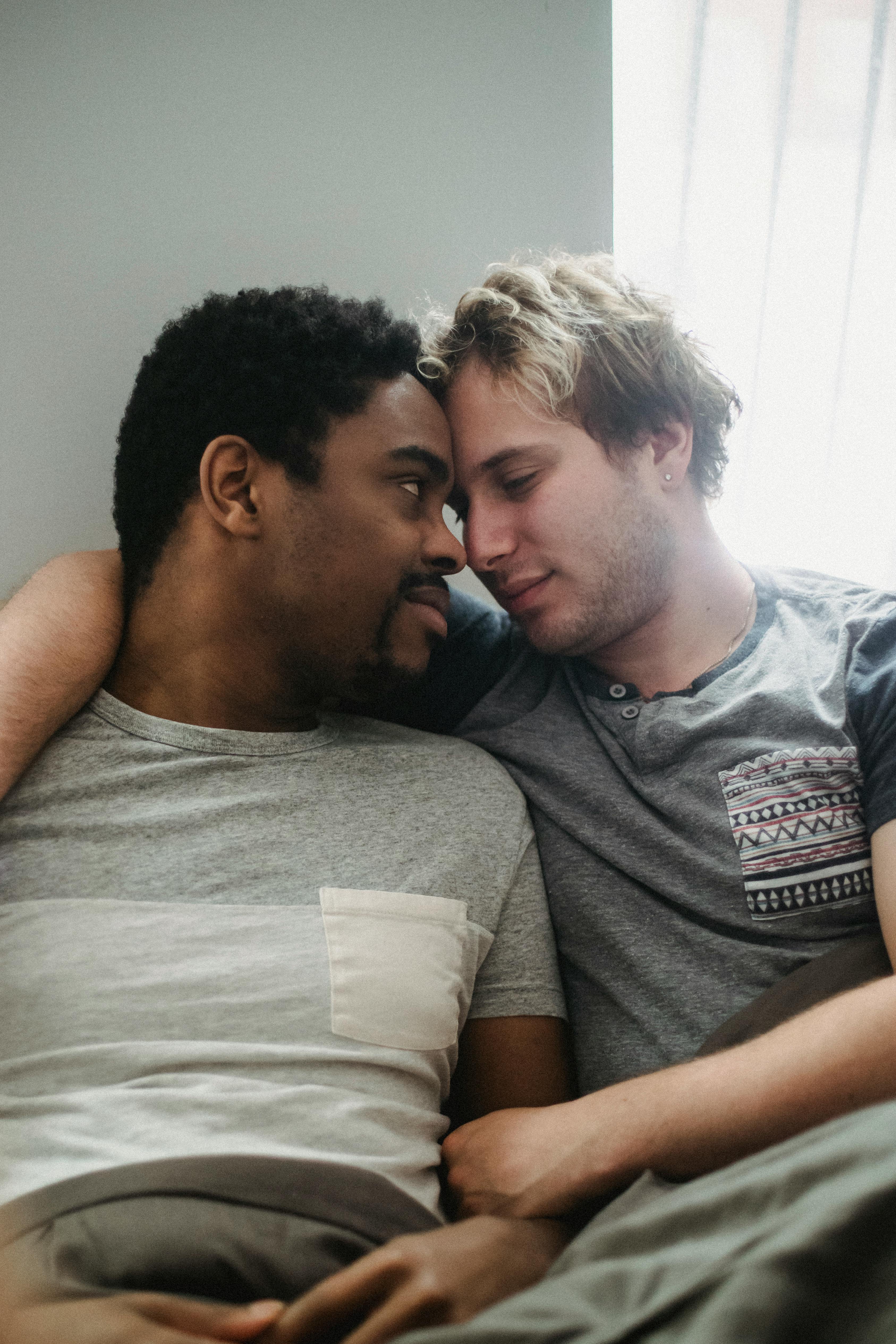 two men touching foreheads