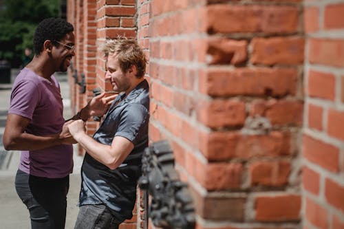 Two Men Holding Hands