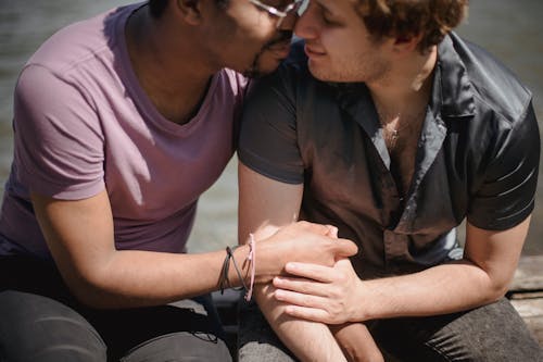 Free Two Men Holding Hands Stock Photo