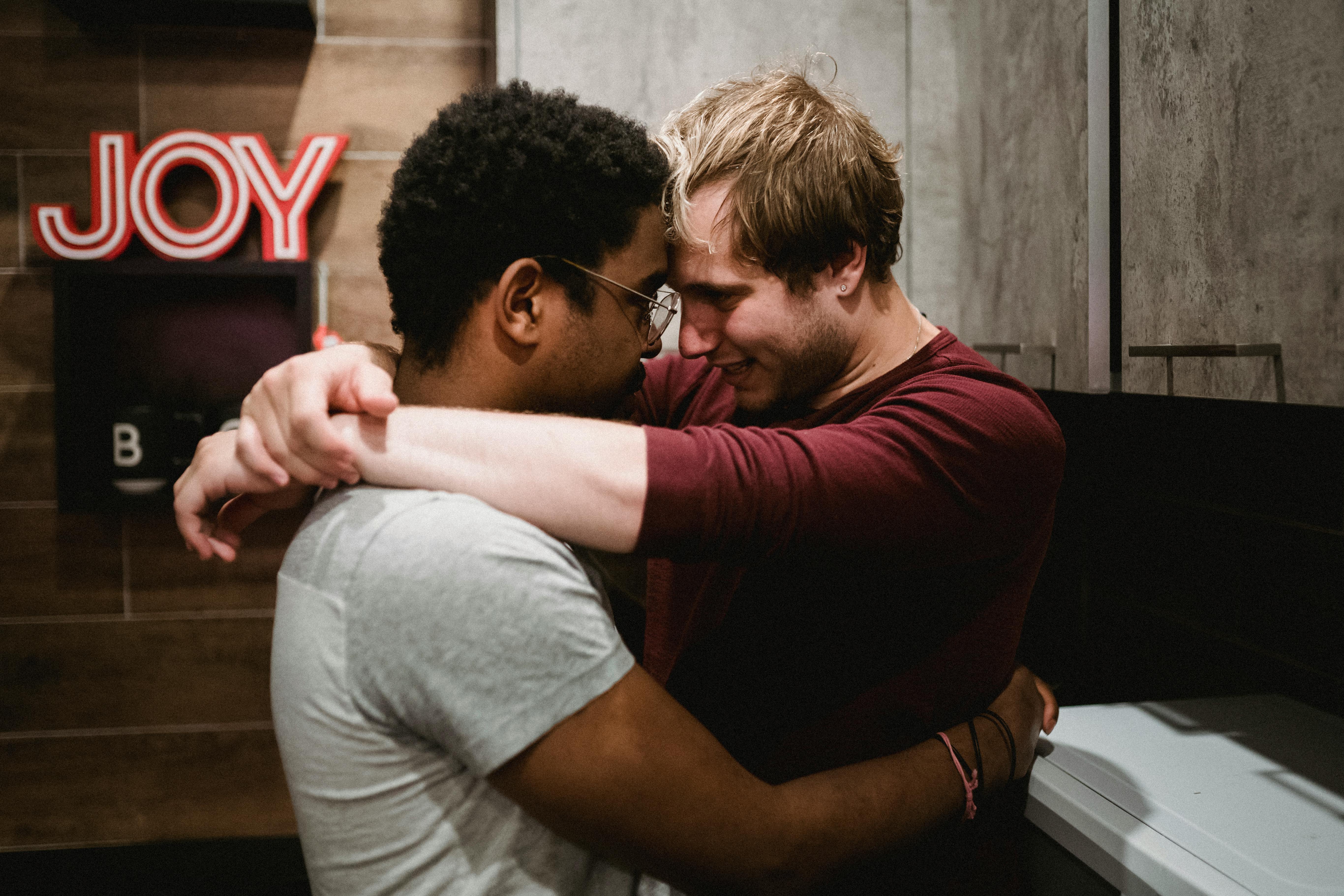 two men being affectionate