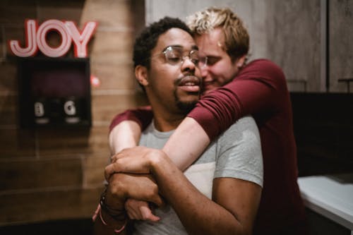 Free Two Men Being Affectionate Stock Photo