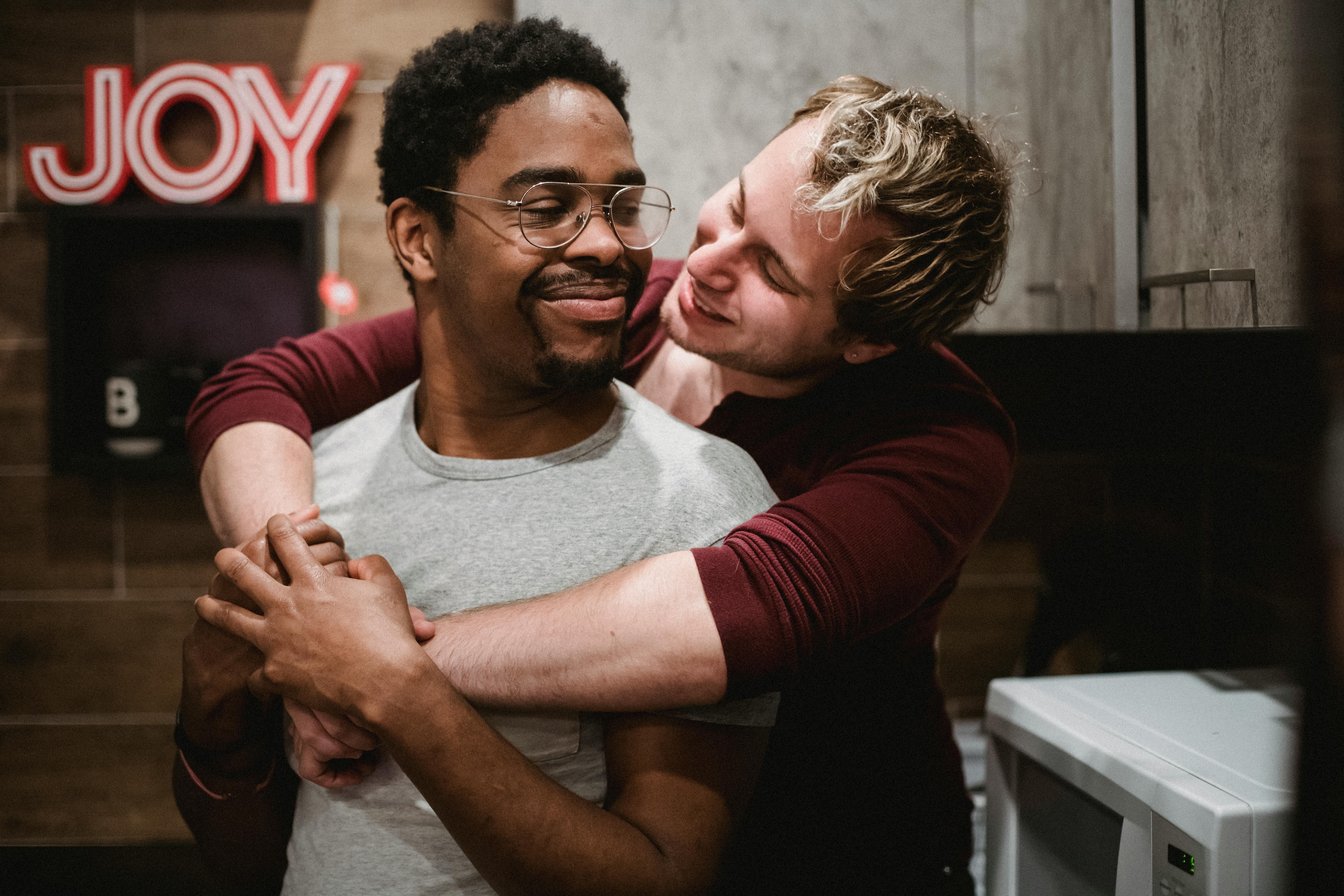 two men being affectionate