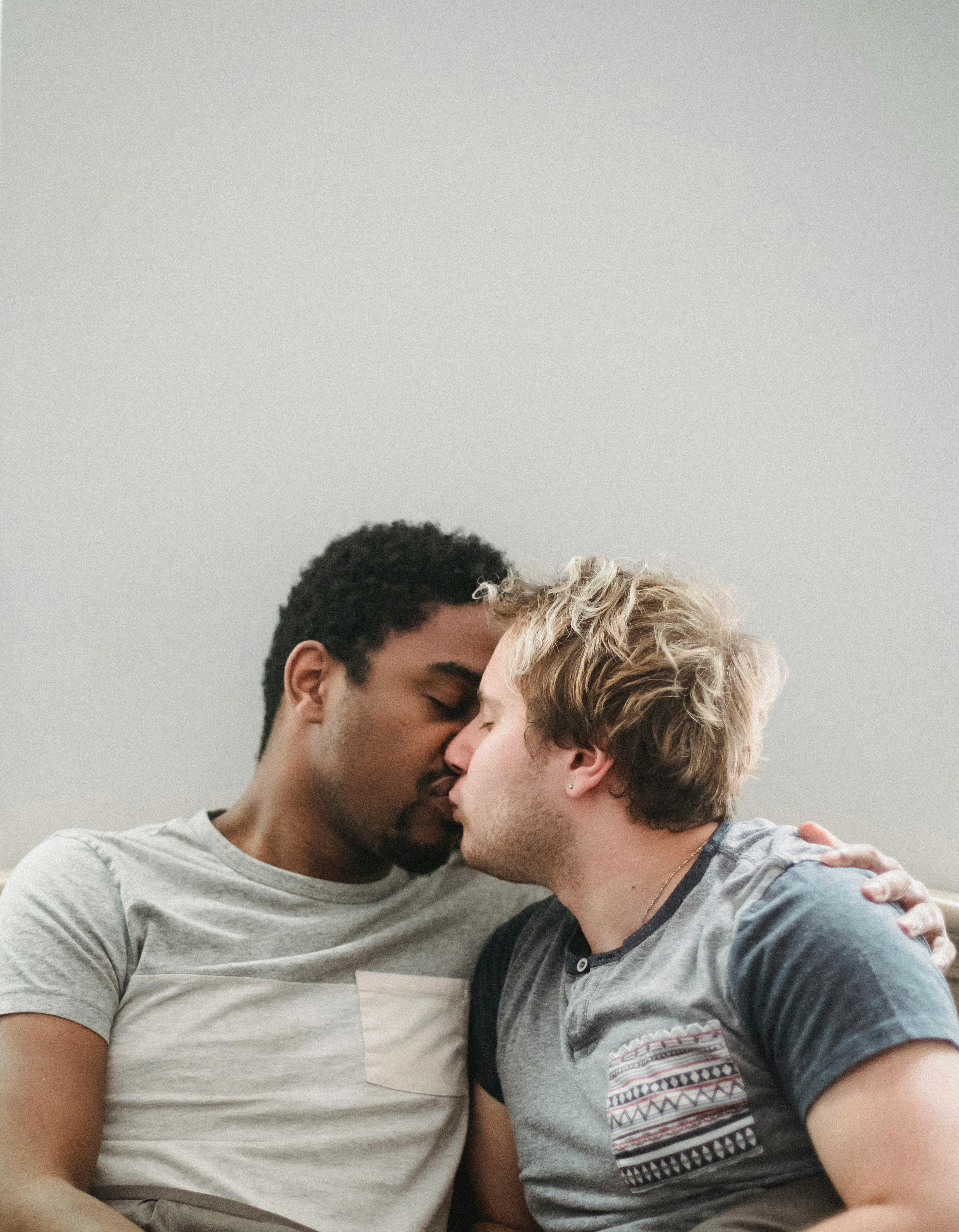 same sex couple kissing