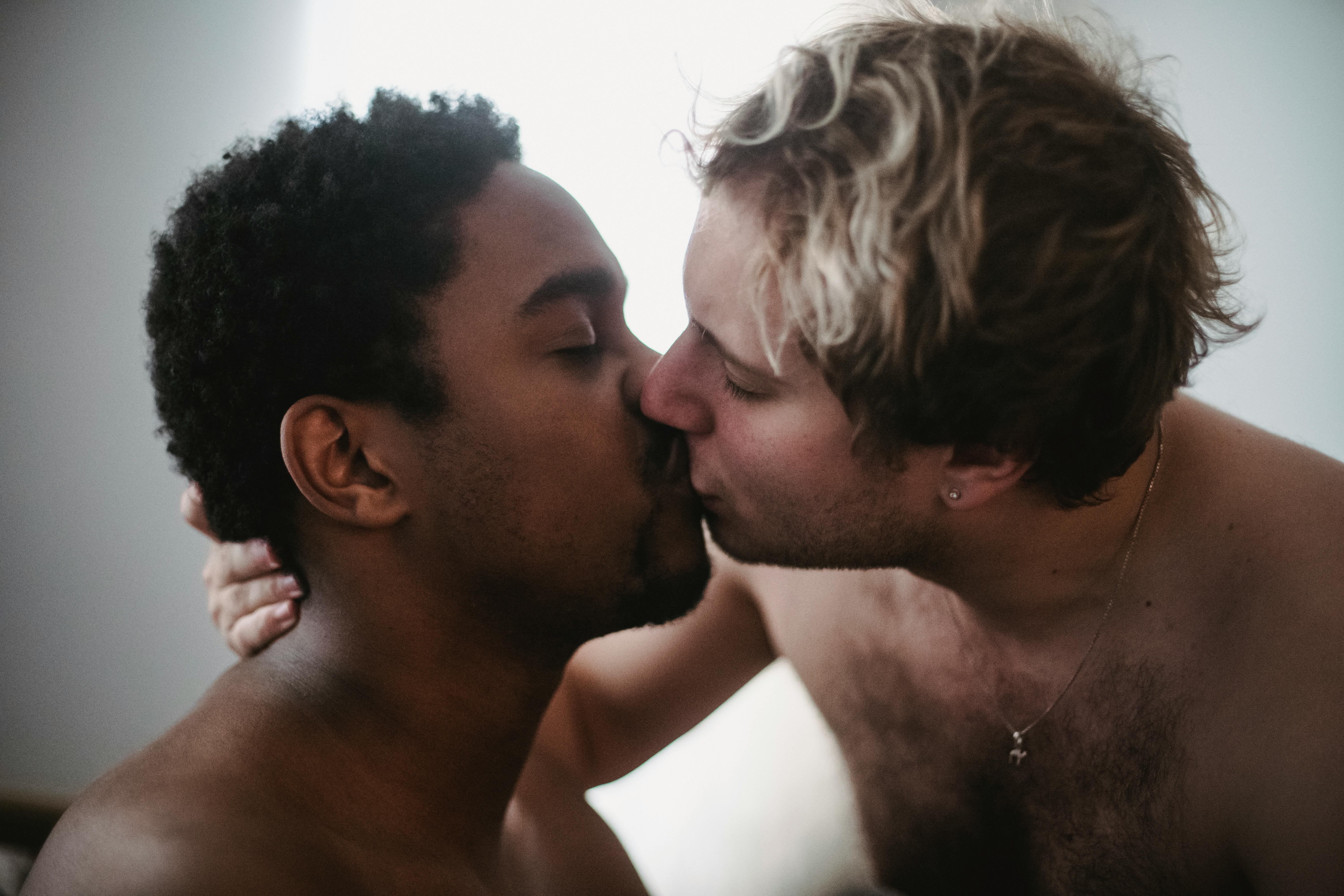 two men kissing