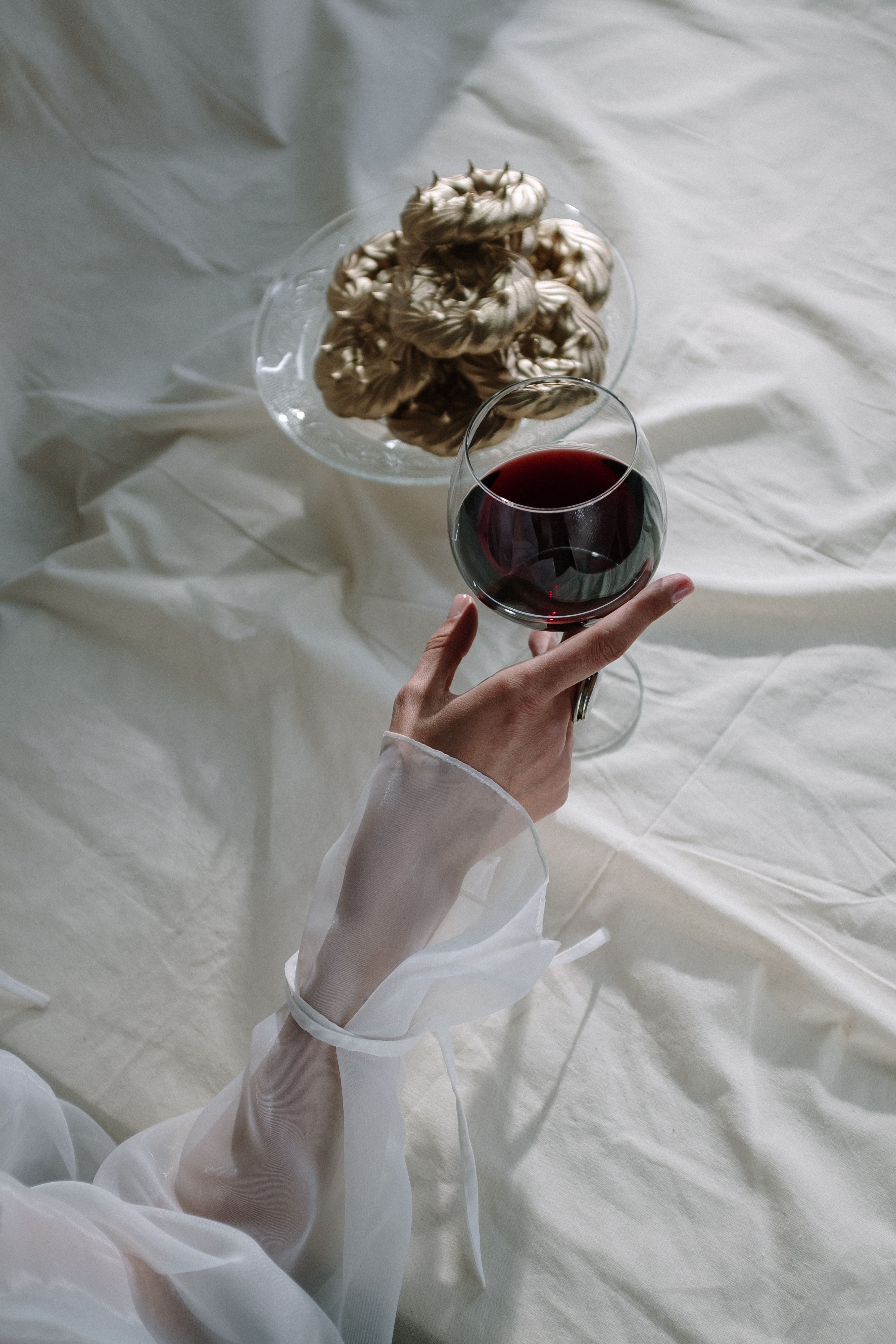 Woman Holding Wine Glass With Red Wine · Free Stock Photo