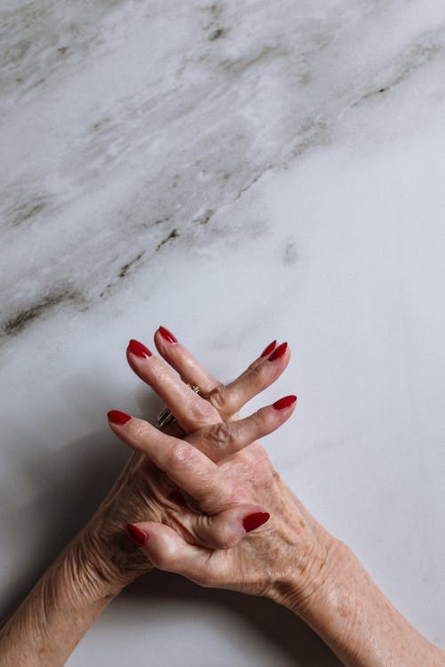 Persons Left Hand on White Snow