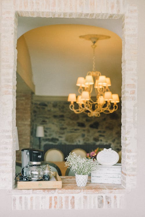 Free A Wooden Tray with Coffee Maker Beside Potted Plant Stock Photo