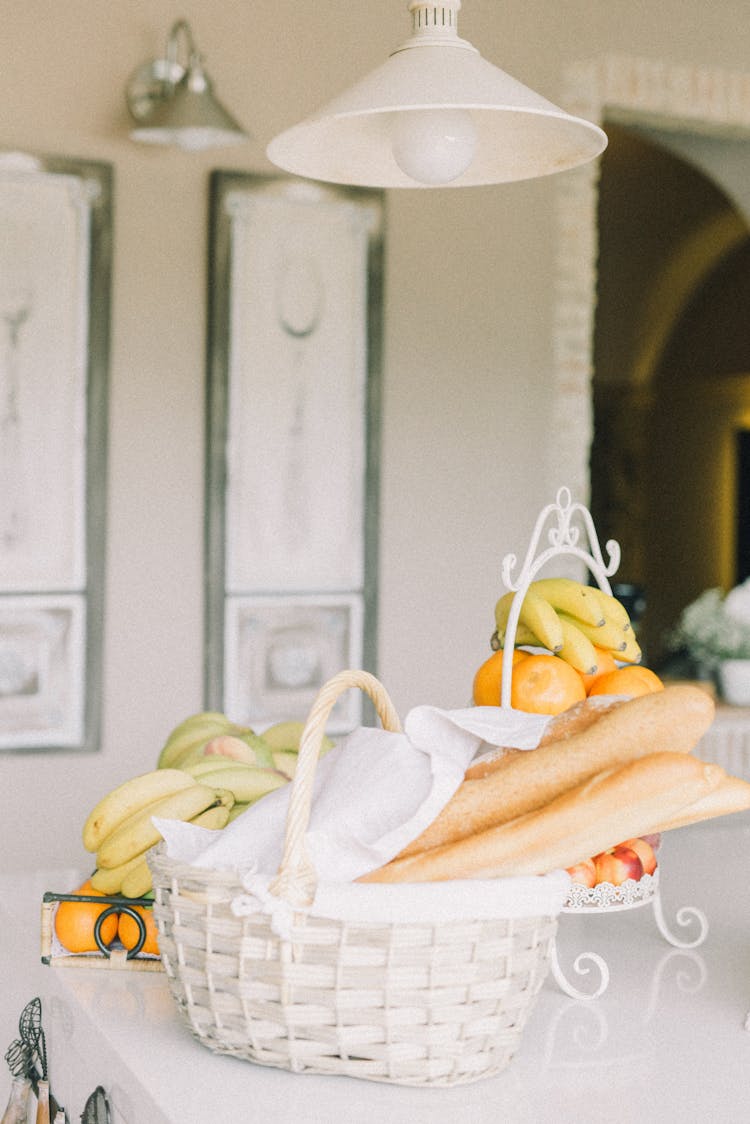 Yellow Bananas And Bread On The Countertop