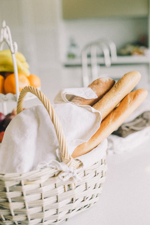 Free Bread on Brown Woven Basket Stock Photo