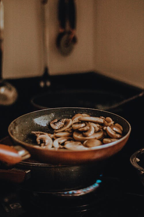 Free Photo of Mushroom Cooking in Frying Pan Stock Photo