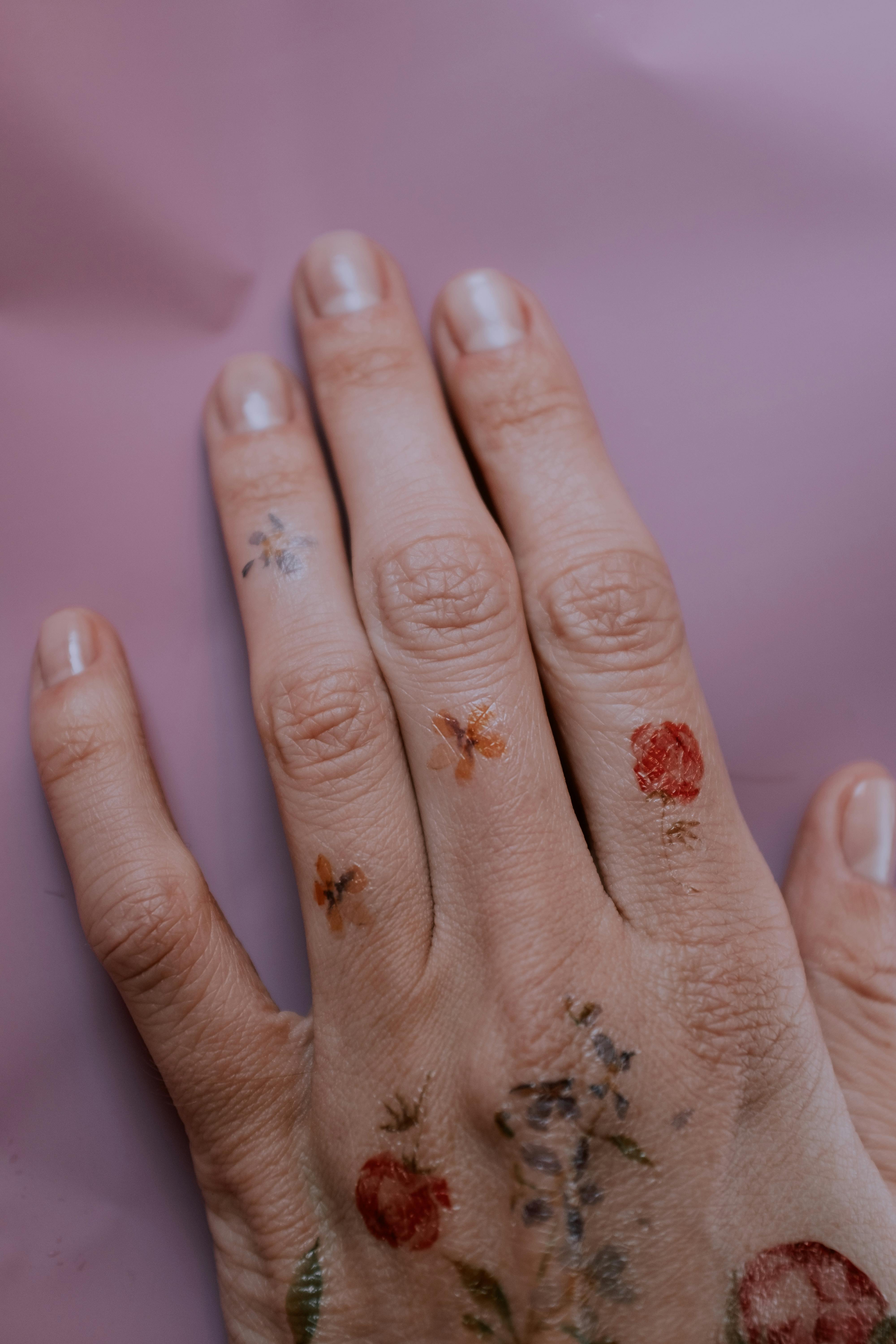 45 Flower Tattoos On Fingers