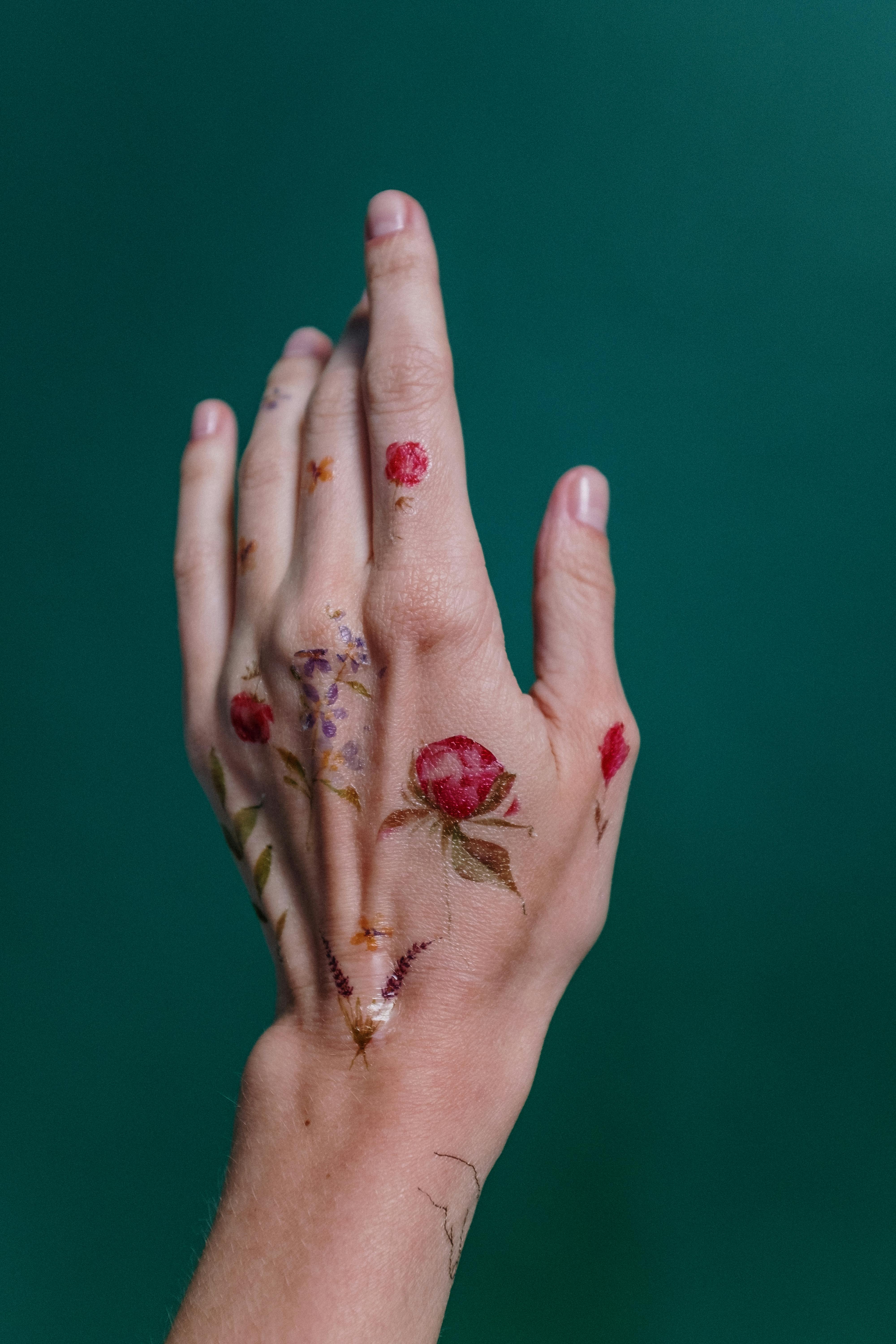 Daffodil and Marigold Small Tattoo | Finger tattoos, Hand and finger tattoos,  Flower finger tattoos