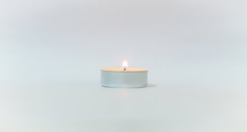 White Candle on White Background