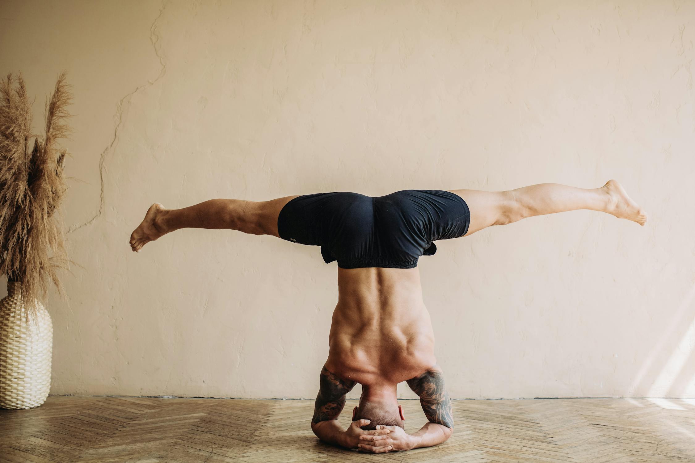 Photo of Man Doing Head Stand · Free Stock Photo