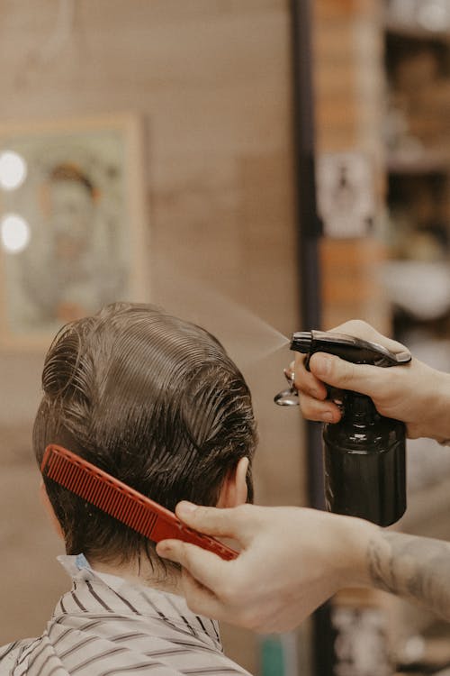 Photo of Person Getting His Haircut