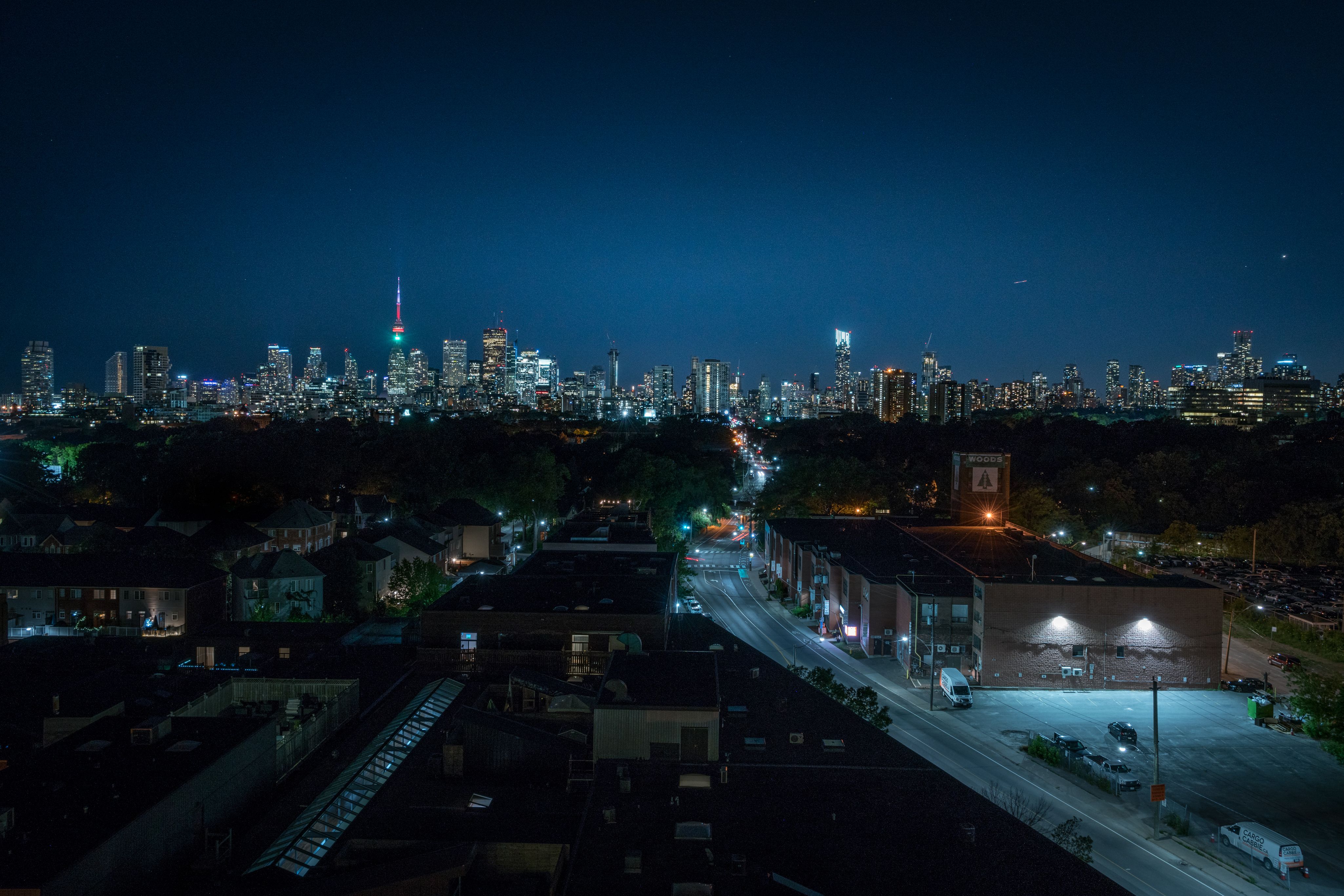 City With High Rise Buildings during Night Time · Free Stock Photo