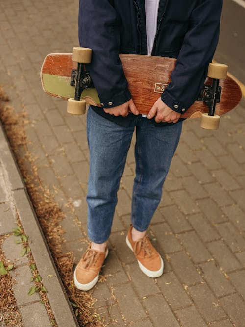 Free Person Holding Longboard Stock Photo