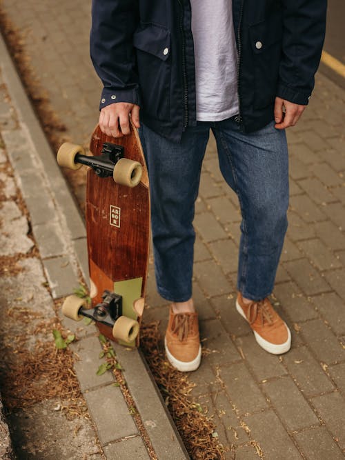 Free Person Holding Longboard Stock Photo