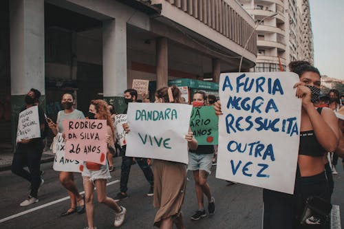 People Rallying In The Street