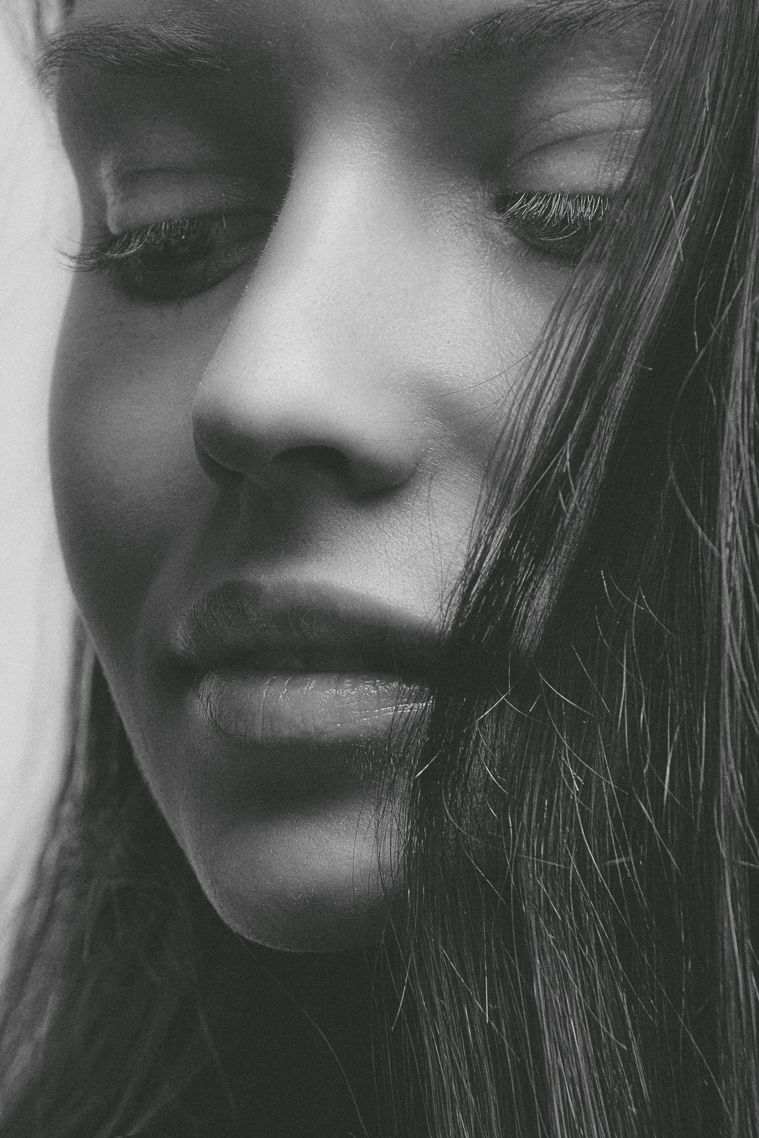 Grayscale Photo of Woman's Face