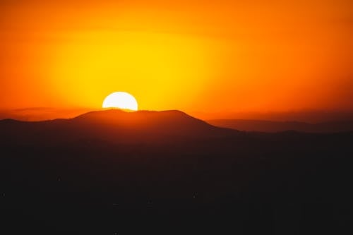 Silhouette of Mountain during Sunset