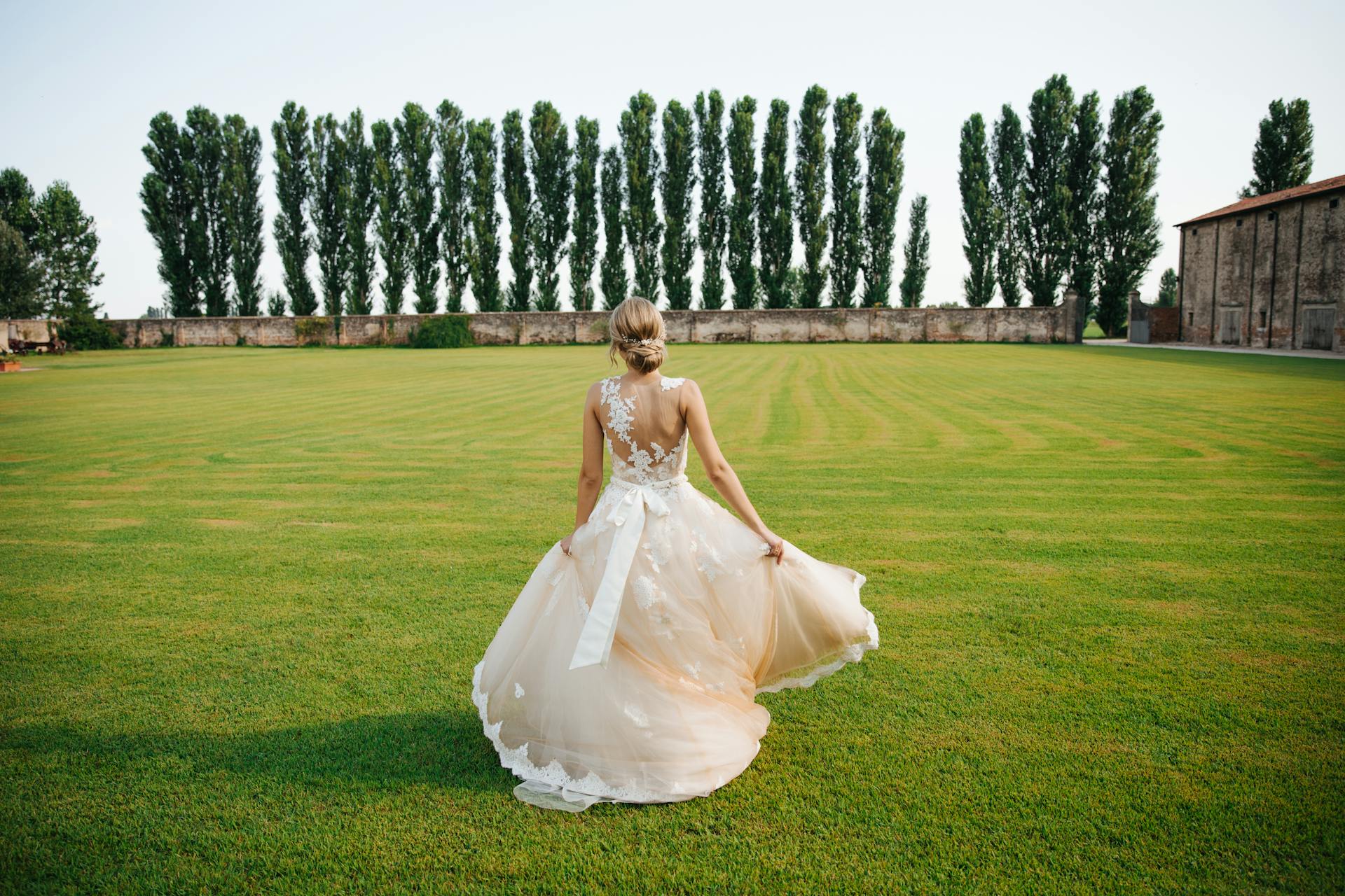 Photo Of Woman Wearing White Gown 