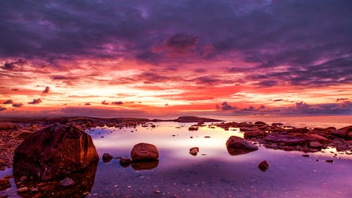 Scenic Photo Of Seashore During Dawn 