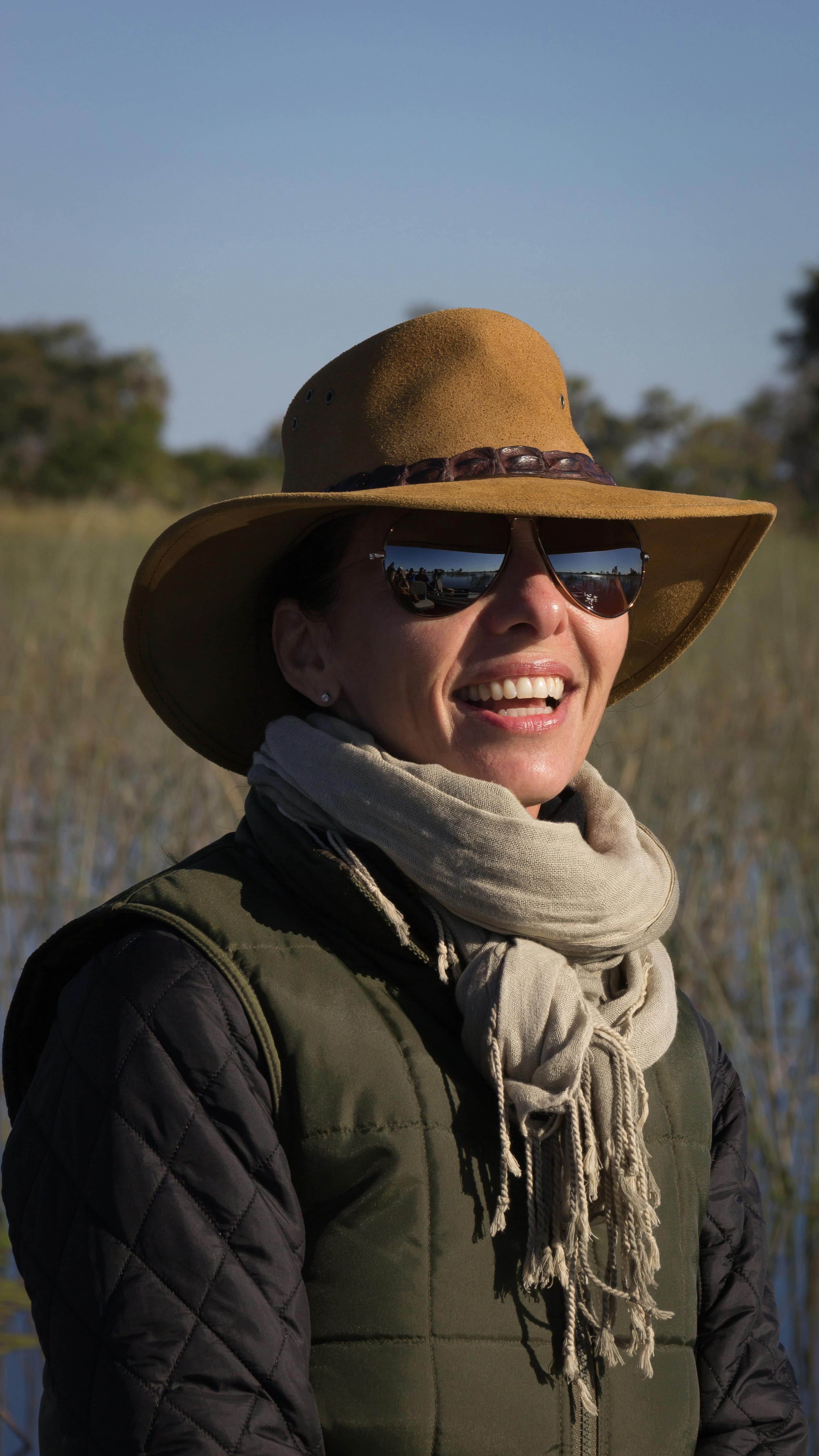 photo of woman wearing cowboy hat