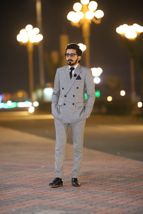 Photo Of Man Wearing Grey Suit