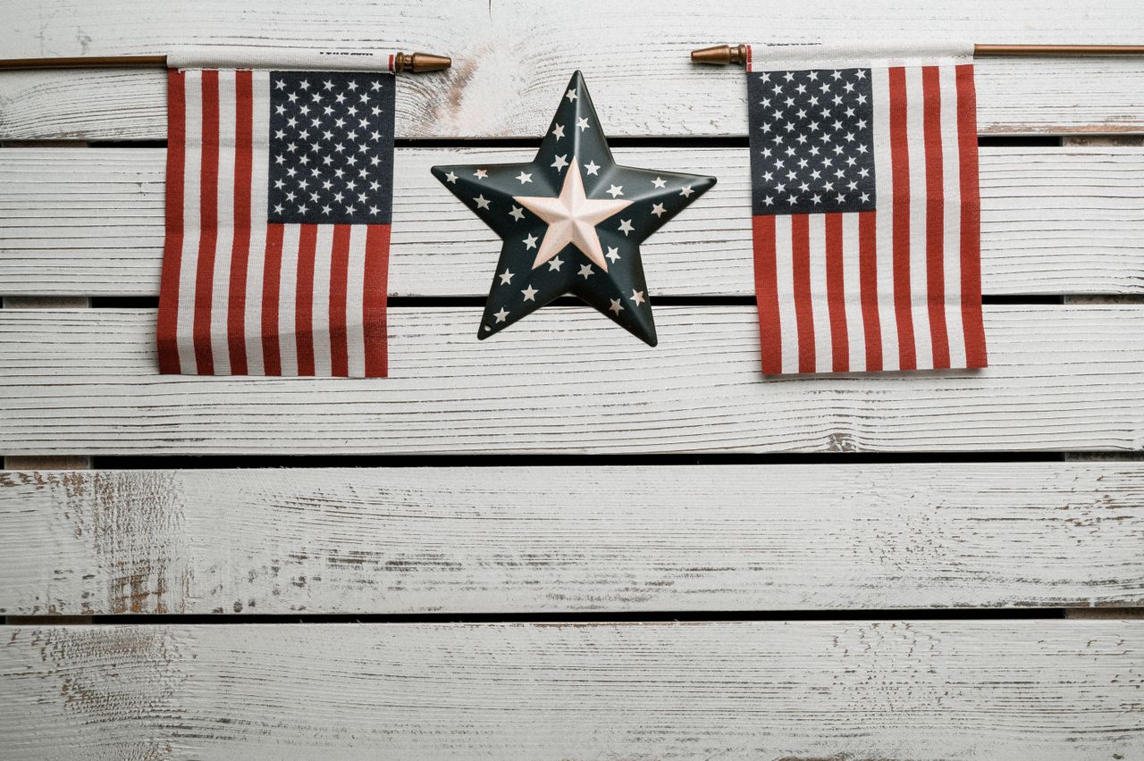 patriotic-gallery-5 American flags and a star decoration on a white wooden wall