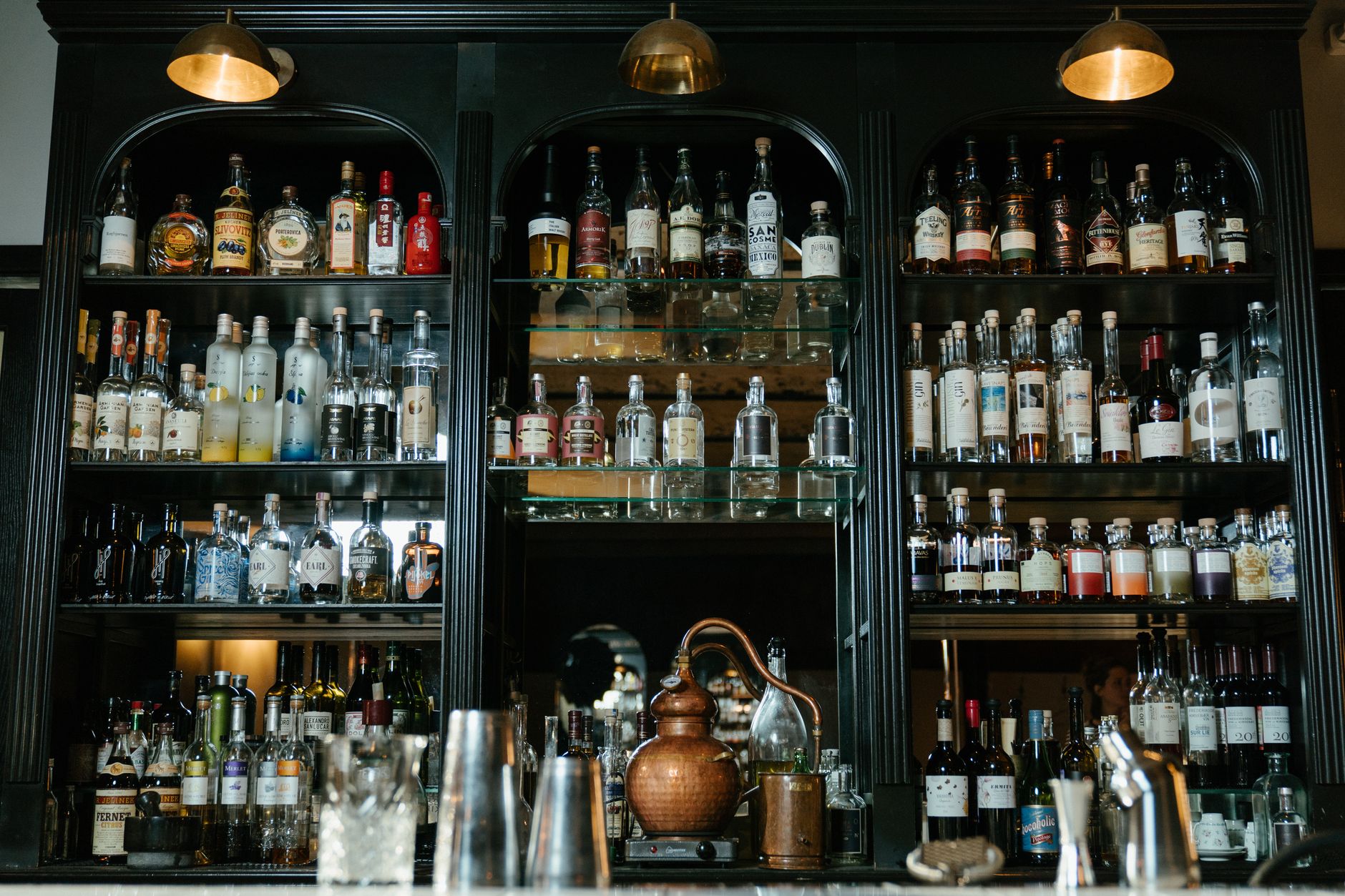 Bartender mixing a whiskey cocktail at a Nashville whiskey bar