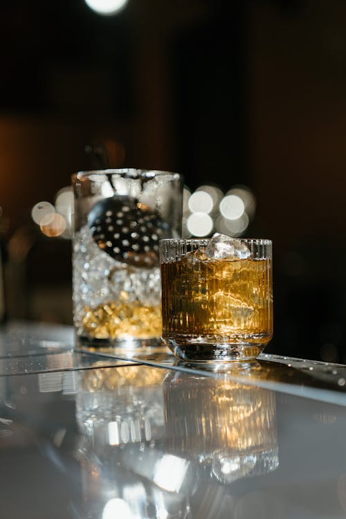 Clear Drinking Glass With Brown Liquid