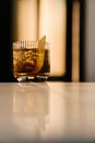 Clear Drinking Glass With Brown Liquid