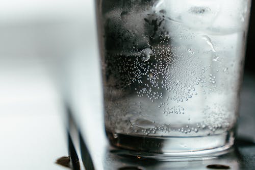 Water in Clear Glass Bottle