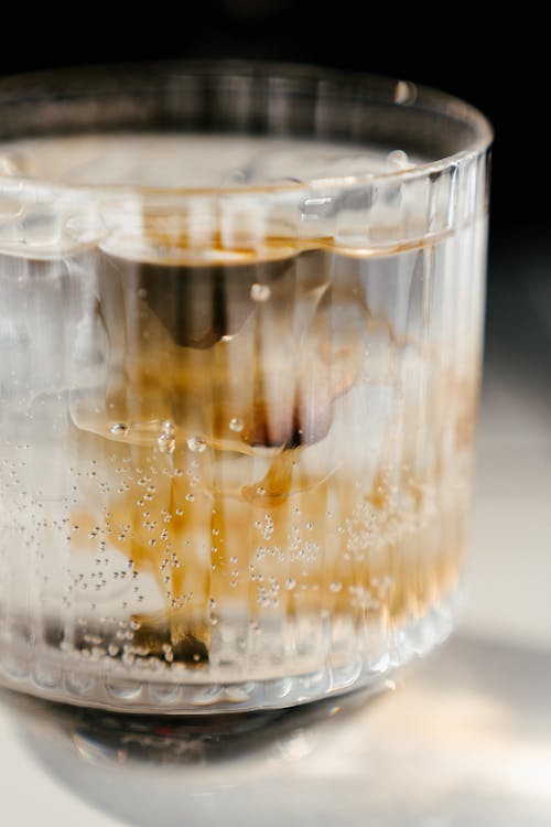 Clear Glass Cup With Brown Liquid