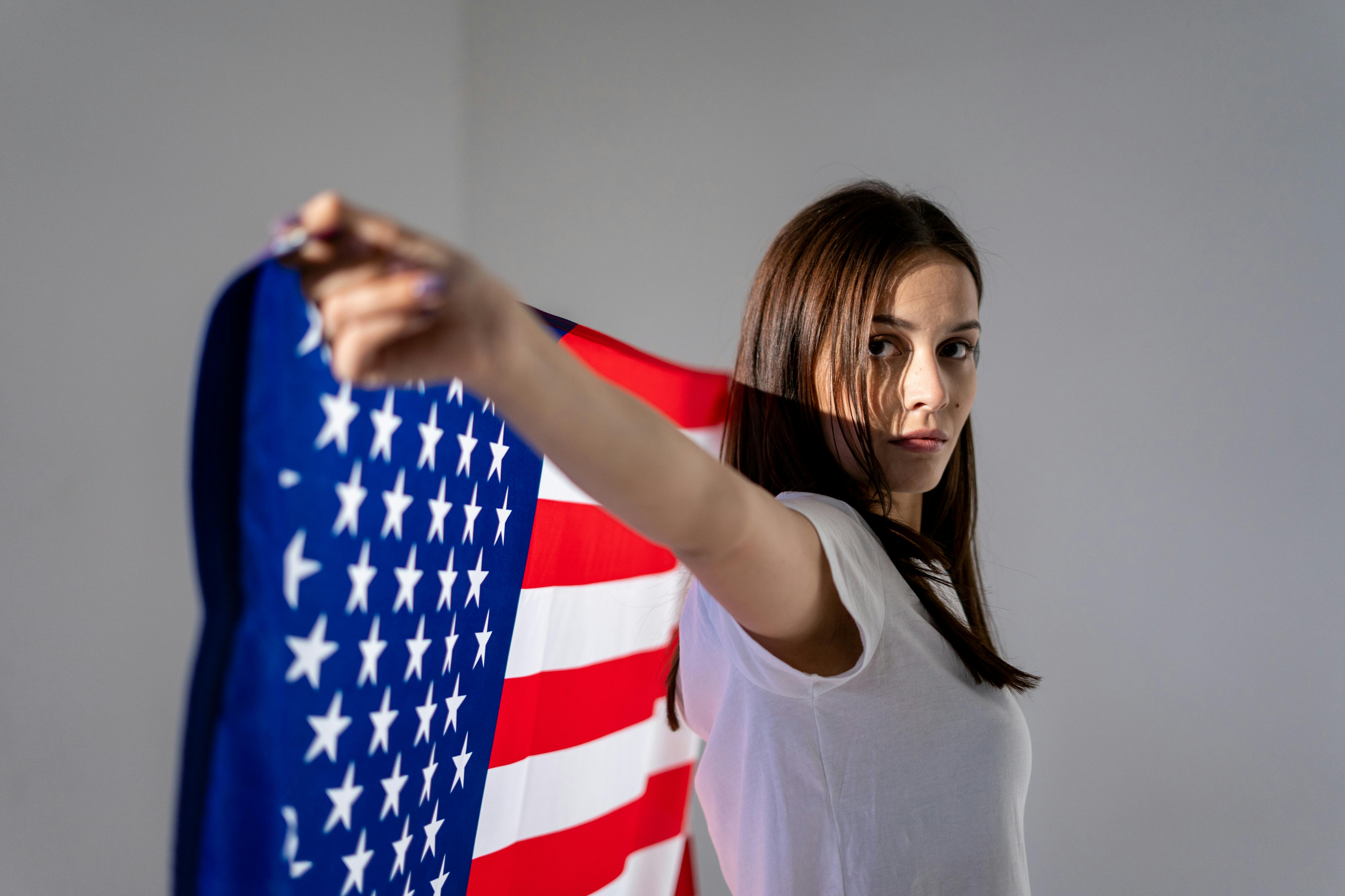 Woman Holding an American Flag