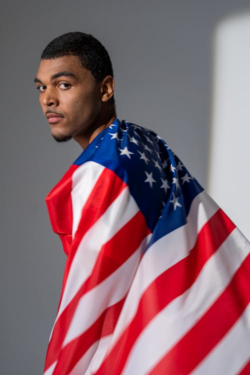 Free Man with an American Flag Stock Photo