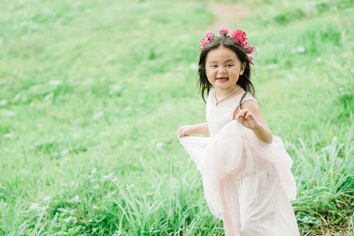 Photo Of Child Wearing White Dress