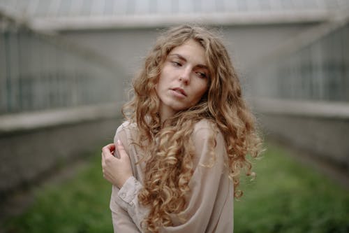 Woman in White Long Sleeve Shirt