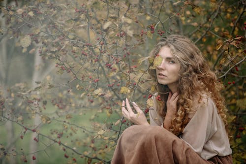 Photo Of Woman Holding Stem