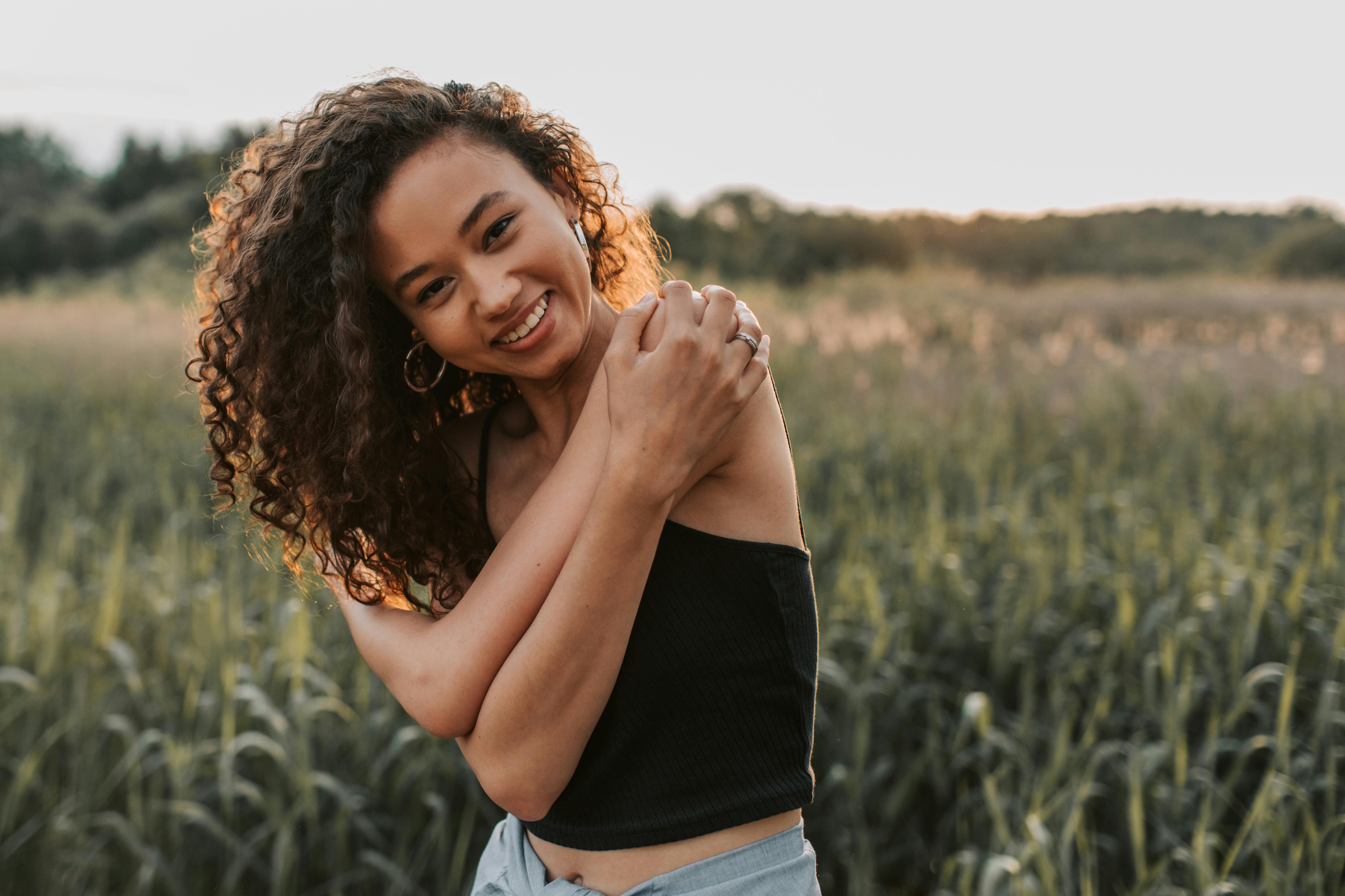 photo of woman wearing black top