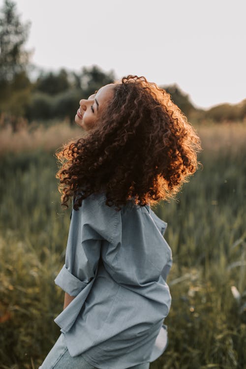 Free Photo Of Woman Wearing Blue Dress Shirt Stock Photo