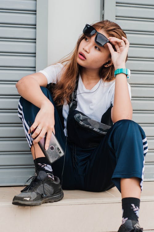 Photo Of Woman Wearing Blue Jogging Pants