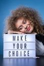 Smiling Woman With a Sign