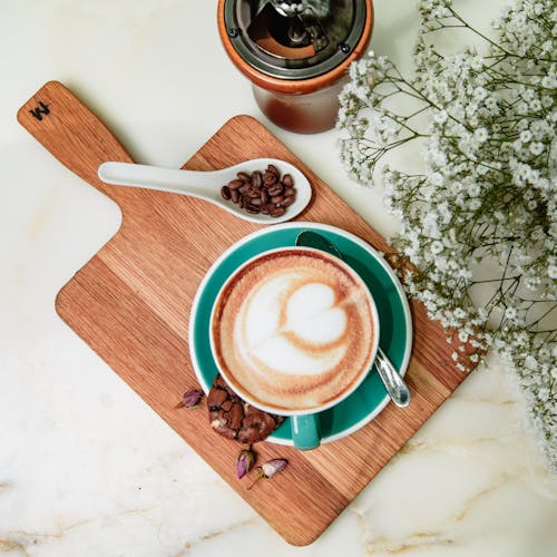 Free Photo Of Coffee Mug On Top Of Wooden Chopping Board Stock Photo