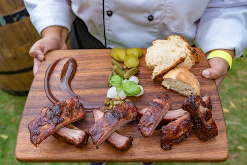 Free Photo Of Grilled Meat On Wooden Chopping Board Stock Photo