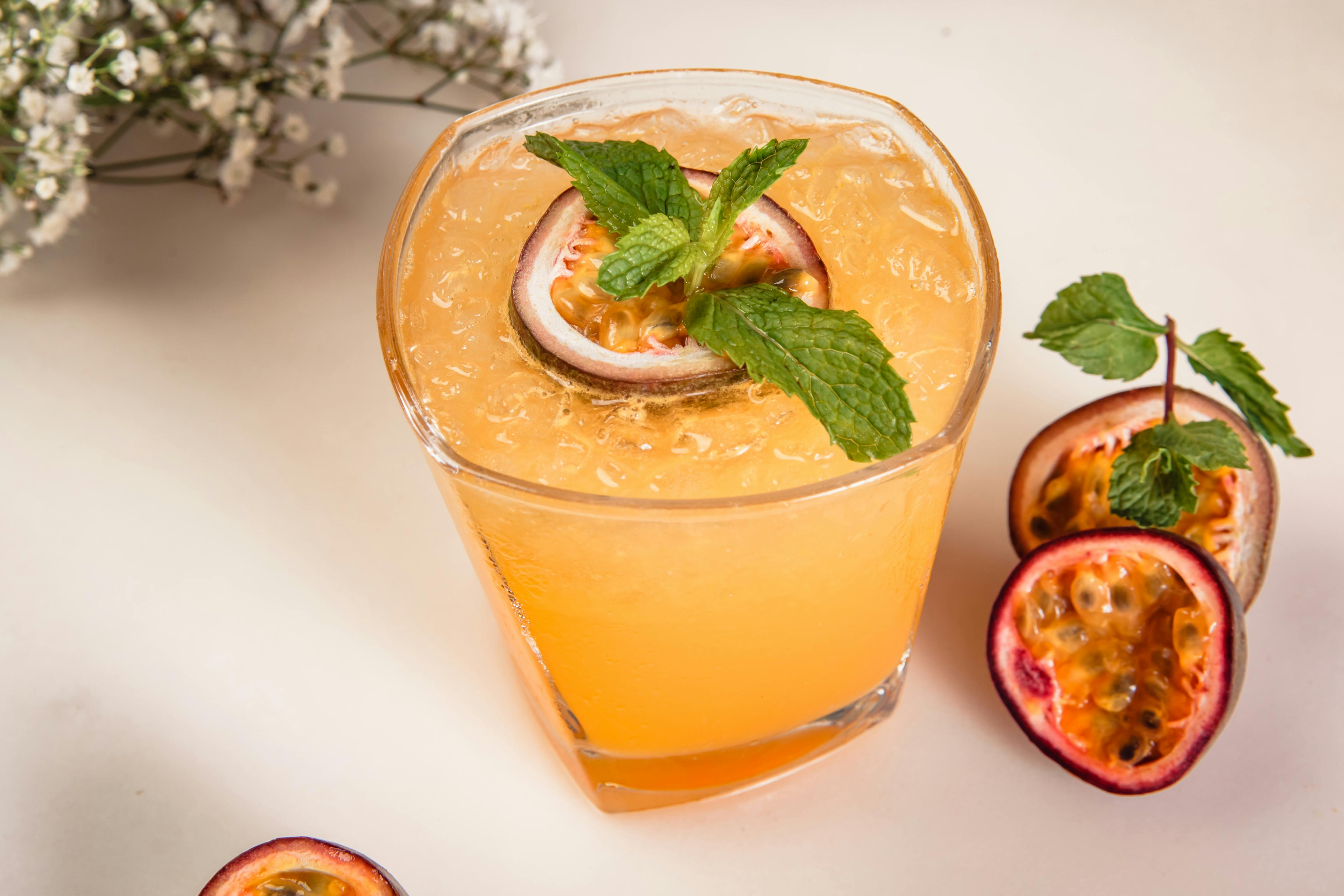 CloseUp Photo Of Yellow Beverage · Free Stock Photo