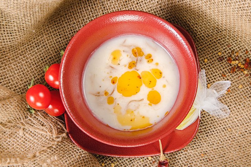 curried lentil soup with a swirl of yogurt on top