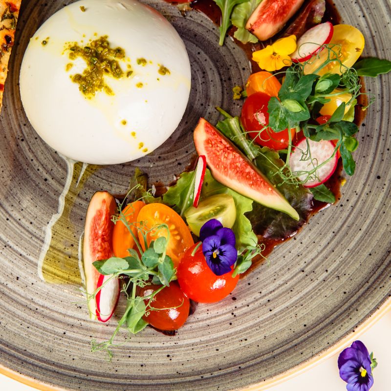 Pugliese Green Salad with Burrata, Tomato Confit and Basil Oil